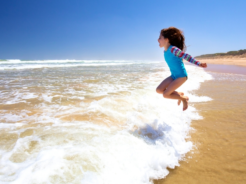 Child having fun at the beach Sussex Inlet NSW