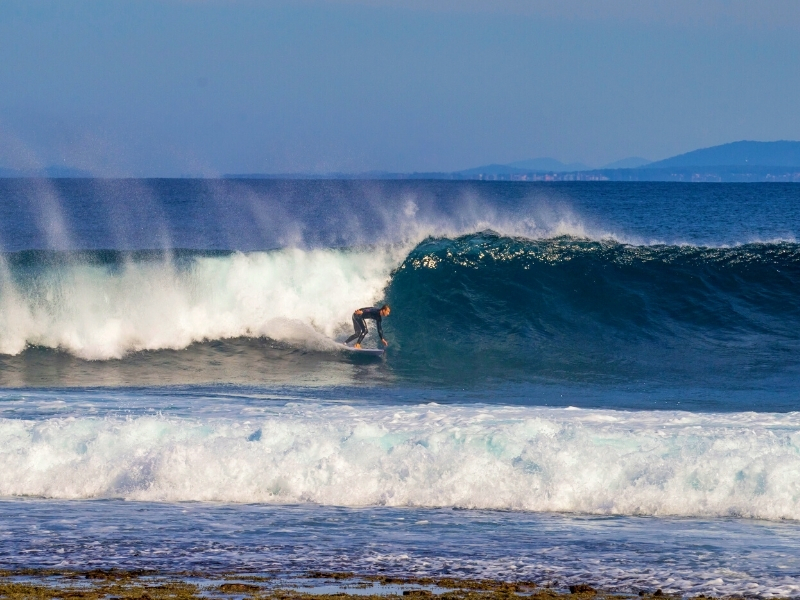 Surfing, Wreck Bay - Credit Dee Kramer